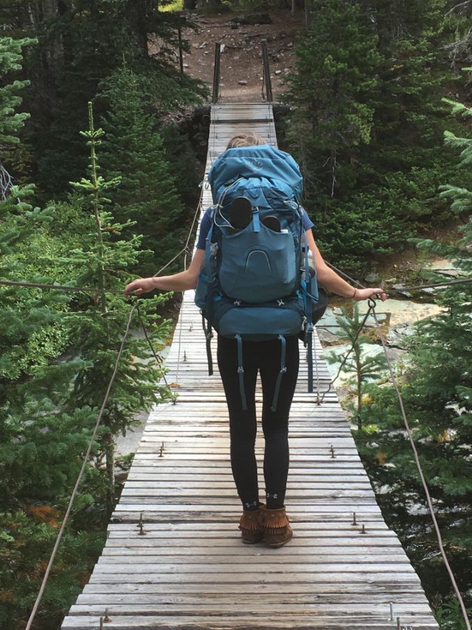 Me crossing a bridge in glacier national park